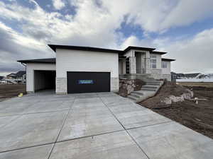 View of front of home with a garage