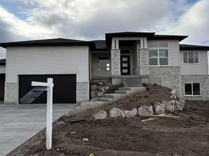 View of front of house with a garage