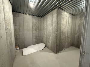 Bathroom featuring concrete flooring