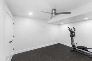 Exercise area featuring ceiling fan