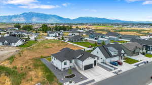 Birds eye view of property with a mountain view