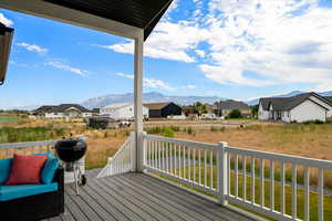 Wooden deck featuring a mountain view