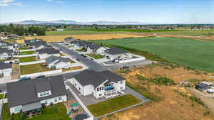 Birds eye view of property with a mountain view