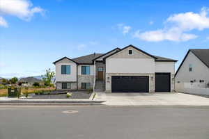 View of front of home with a garage