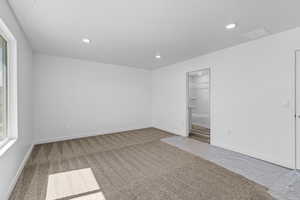 Empty room featuring carpet flooring