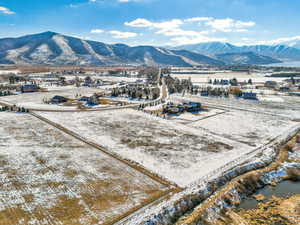 Snowy aerial view with a mountain view