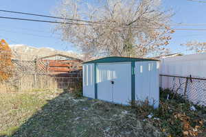 View of outbuilding featuring a mountain view