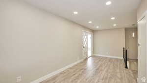 Foyer featuring light wood-type flooring