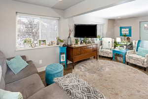 Living room featuring hardwood / wood-style flooring