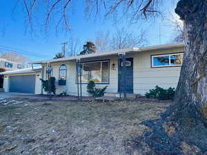 Single story home with a garage