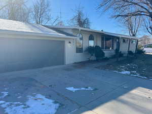 Single story home with a garage