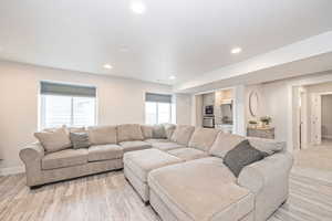 Living room featuring light hardwood / LVP