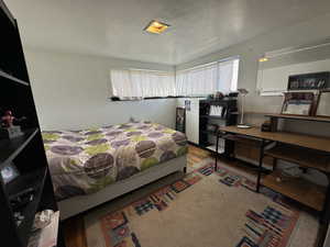 Bedroom featuring hardwood / wood-style flooring