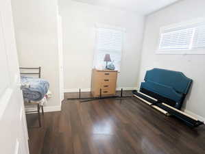 Interior space featuring dark hardwood / wood-style flooring