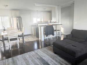 Living room with hardwood / wood-style floors