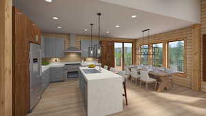 Kitchen featuring gray cabinetry, wall chimney exhaust hood, hanging light fixtures, high quality appliances, and a kitchen island