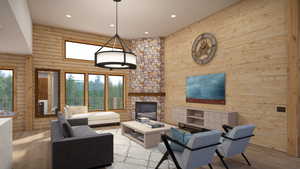 Living room featuring wooden walls, a fireplace, and light hardwood / wood-style floors