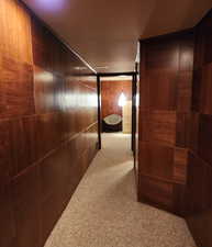 Walnut paneled hallway to 4th bedroom