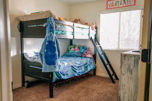 Bedroom featuring carpet