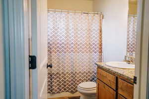 Bathroom with vanity and toilet