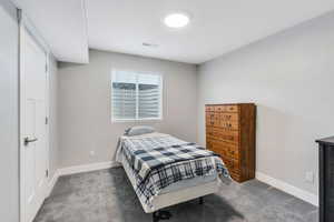 Bedroom featuring carpet flooring