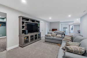 Living room with light carpet