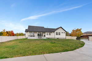 View of front of property featuring a front yard