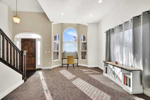 View of carpeted foyer entrance