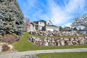 View of front of property with a garage