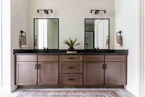 Bathroom with vanity and an enclosed shower