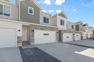 View of property with a garage