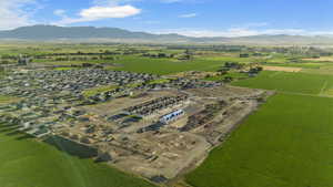 Drone / aerial view with a mountain view and a rural view