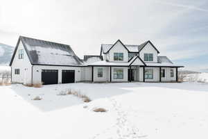 View of front of home with a garage