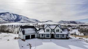 View of front of home featuring a mountain view