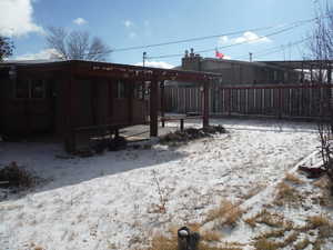 View of snow covered property