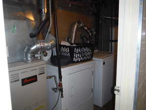 Laundry area with separate washer and dryer