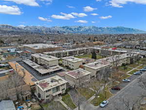 Birds eye view of property with a mountain view