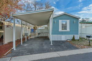 View of car parking with a carport