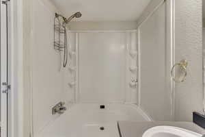 Bathroom featuring shower / bathtub combination