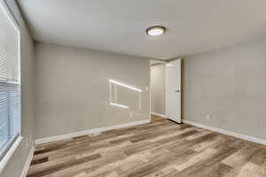 Empty room featuring light hardwood / wood-style floors