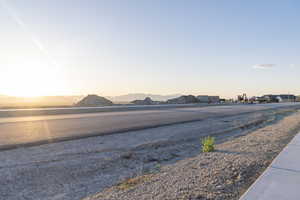 View of water feature with a mountain view