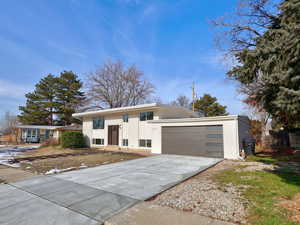 View of front of property featuring a garage