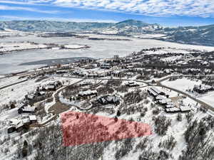 Snowy aerial view with a mountain view