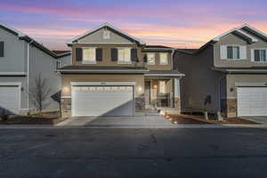 View of front of house with a garage