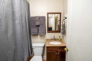 Bathroom with vanity and toilet