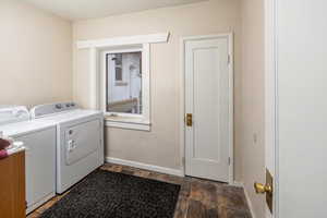 Laundry area featuring separate washer and dryer