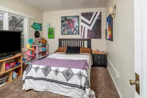 View of carpeted bedroom