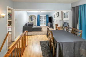 Dining space with light hardwood / wood-style floors