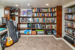 Interior space featuring a textured ceiling