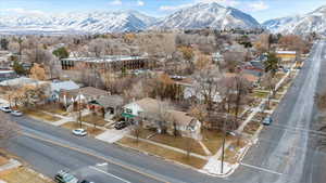 Birds eye view of property featuring a mountain view